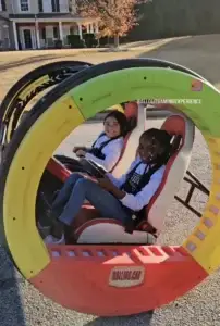 Guests enjoying the 360 Roller Car ride at an All Out Gaming Experience event in Atlanta.