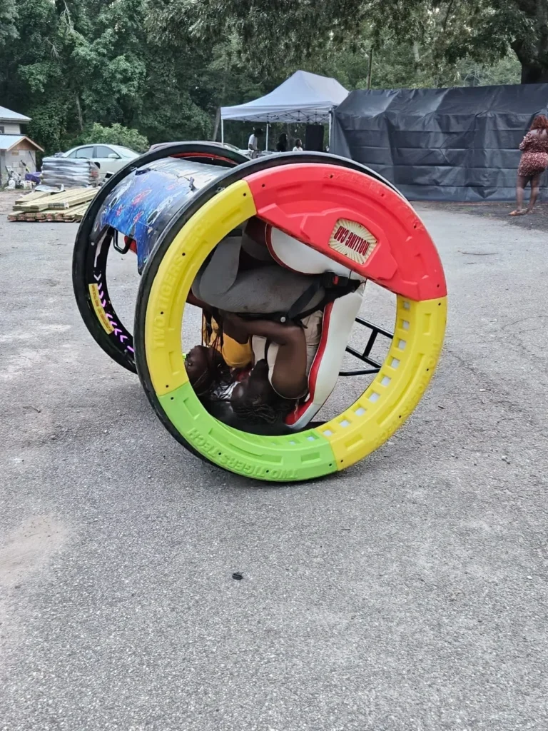 Guests enjoying the 360 Roller Car ride at an All Out Gaming Experience event in Atlanta.