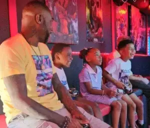 Children playing video games inside the All Out Gaming Experience mobile game truck during an Atlanta birthday party.