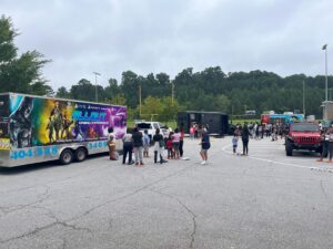 Students enjoying a game truck at an end-of-year school party in Metro Atlanta.